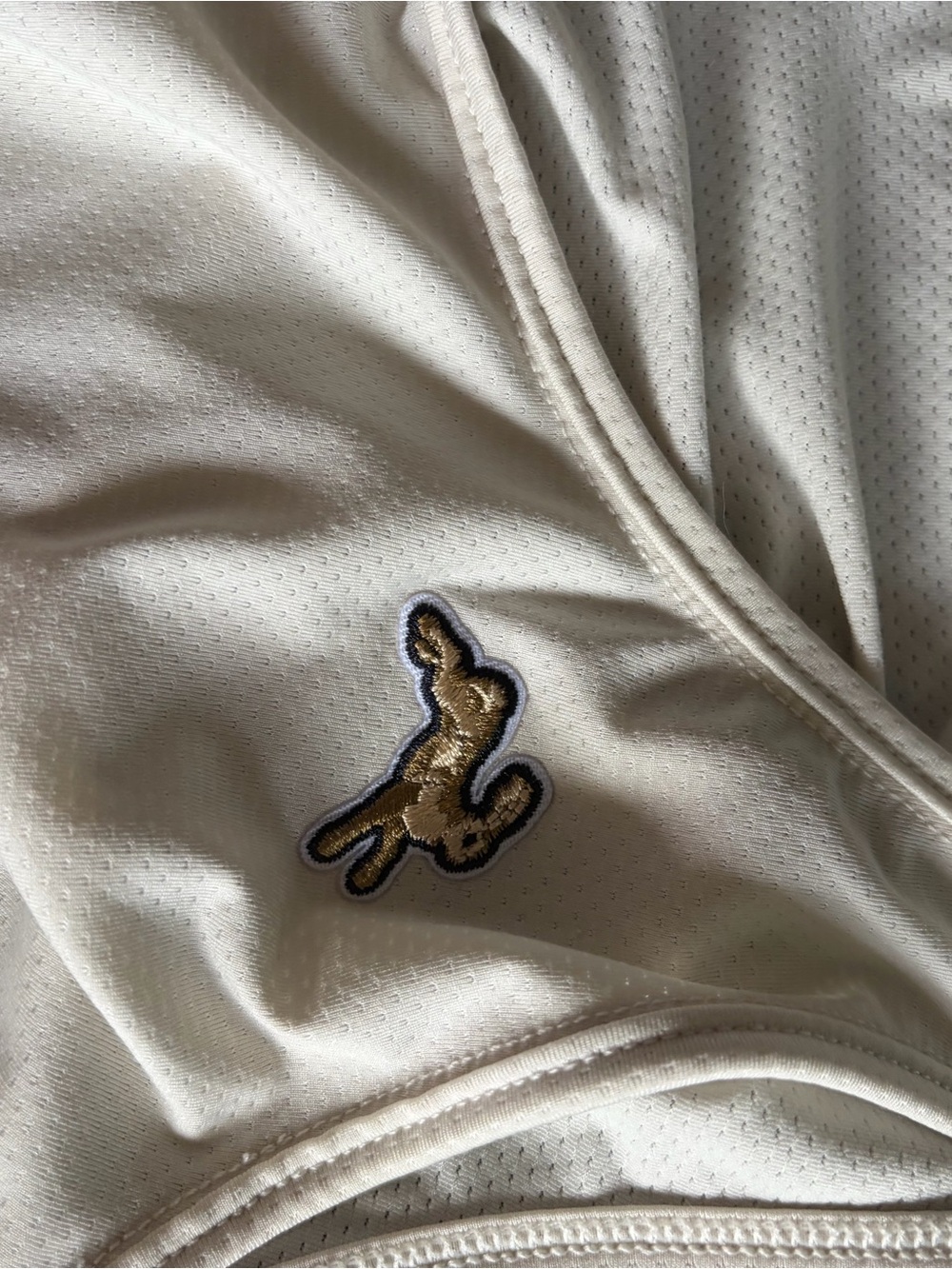 Tracksmith Cream Performance Tank with Rabbit Logo - Picture 11 of 11